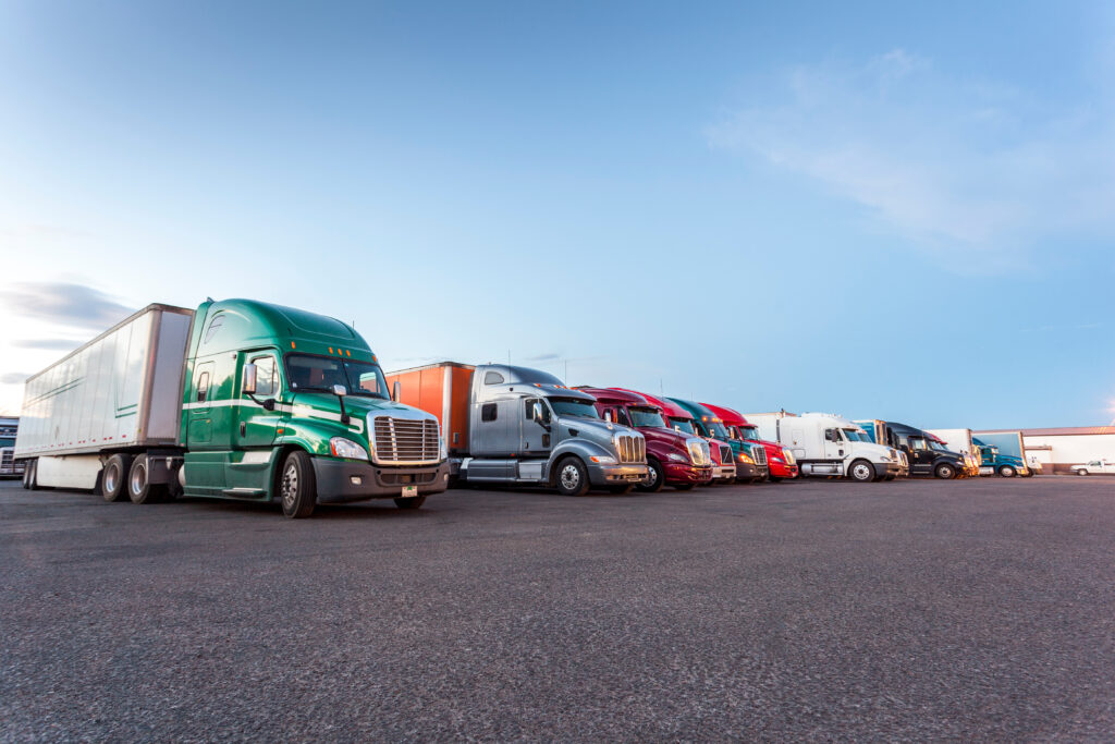 A variety of American Trucks lined up in a row